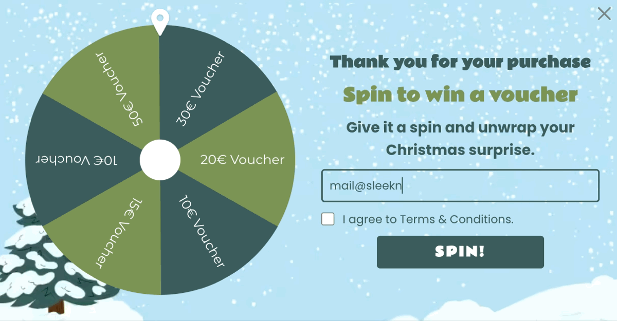 Christmas repeat purchases Spin to Win popup demo showing shopper rewards.